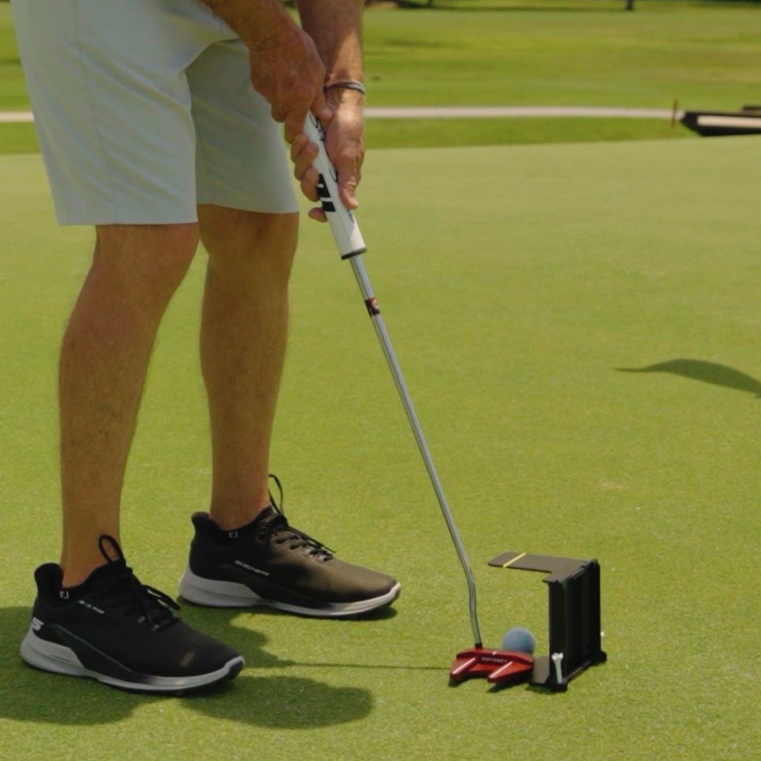 QuietStroke™ Golf Training Aid